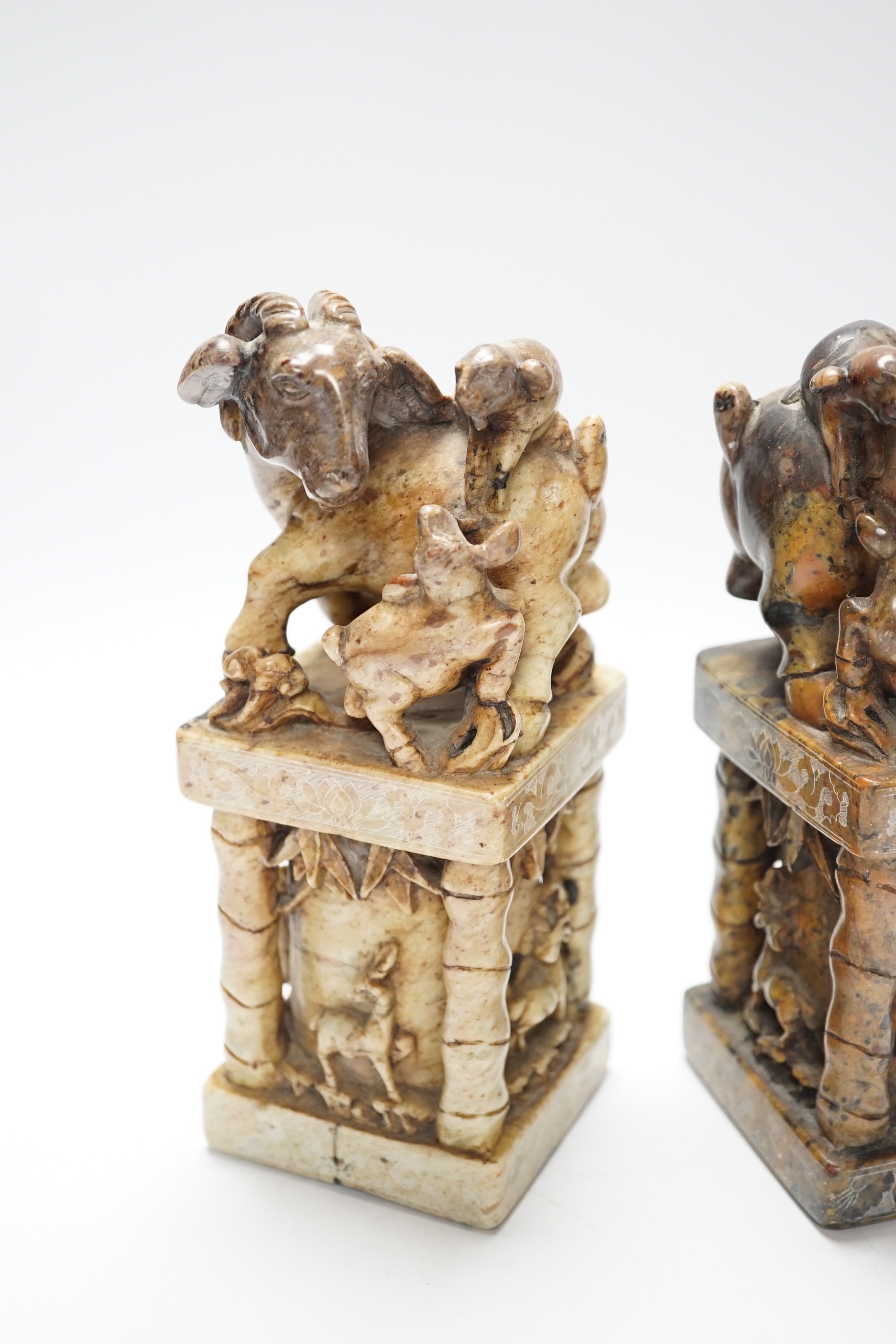 A pair of large Chinese soapstone 'ram' seals, 20cm